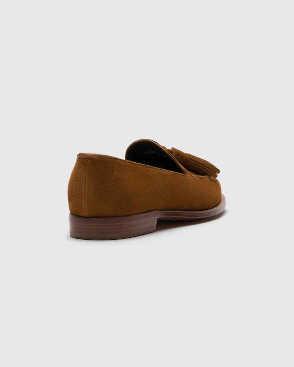 Zapatilla de cuero de gamuza Renee con borlas
